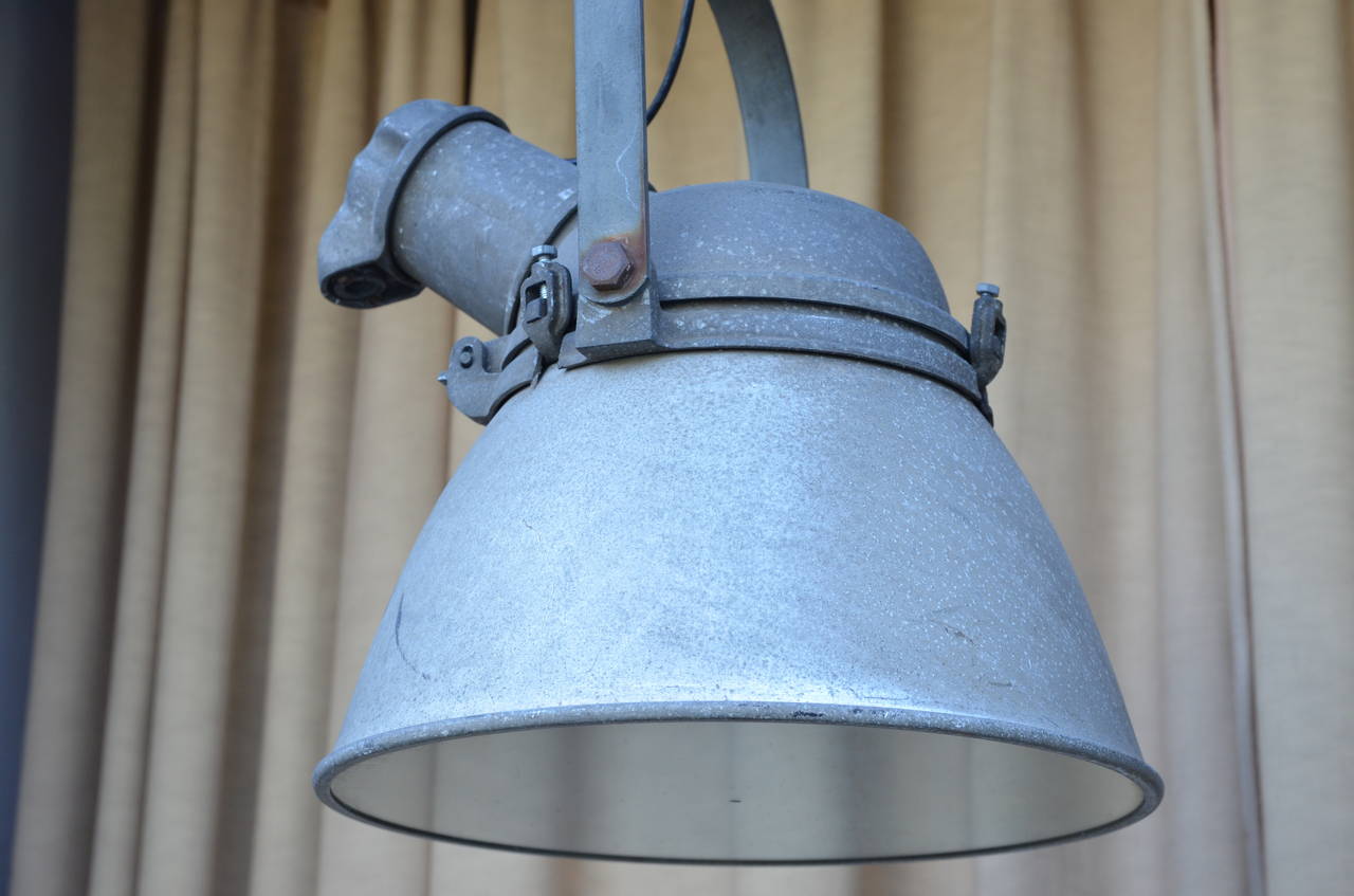 Pair of Large Cast Iron, Aluminum and Glass Industrial Hanging Lights In Good Condition For Sale In Los Angeles, CA