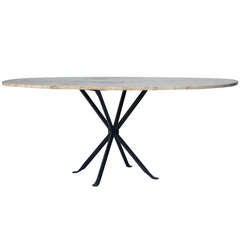 Large oval French 50's travertine and wrought iron table