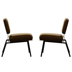 Pair of angular armless lounge chairs