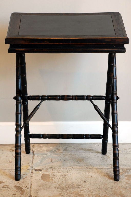 Small ebonized writing table / book display