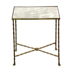 Small gilt bronze and mirror side table by Maison Baguès