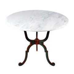 Large patinated iron and marble gueridon / center table