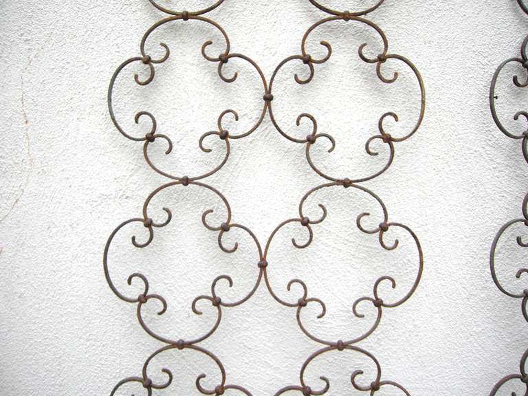 Pair French Hand-wrought Iron Window Grills.
Size given is for each: 23W x .5D x 59.5H
(Showroom Closing/Liquidation, Now on final sale for 400.00pair, reduced from 1,200.00)