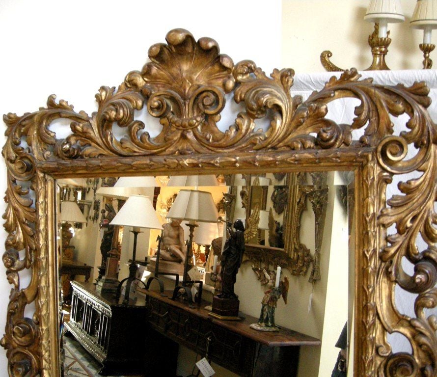 (Now on sale for 3,150.00 - reduced from 6,300.00)
Italian Baroque Style Carved Giltwood Mirror.