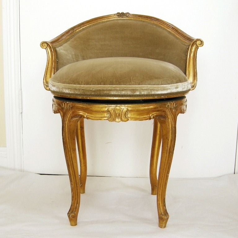 French Louis XV Style Carved Giltwood Vanity Chair w/Swivel Seat.  Upholstered in Silk Velvet.  From the former Rothschild Hancock Park Estate.