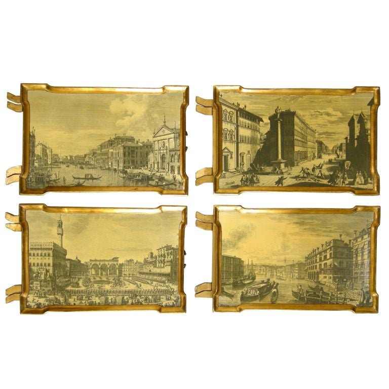 (Now on sale for 1,462.00 set, reduced from 2,925.00)
Italian Set of 4 Giltwood Folding Service Trays Depicting Scenes of Venice and Florence on Matching Stand.  In the manner of Piero Fornasetti.<br />
Note: Overall size when all trays on rack: