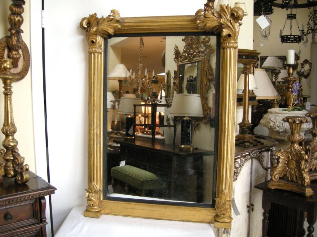 Mid 19th Century Italian Neo-Classic Style Carved Giltwood and Ebonized Mirror.
(Showroom Closing/Liquidation, Now on final sale for 2,200.00, reduced from 5,700.00)