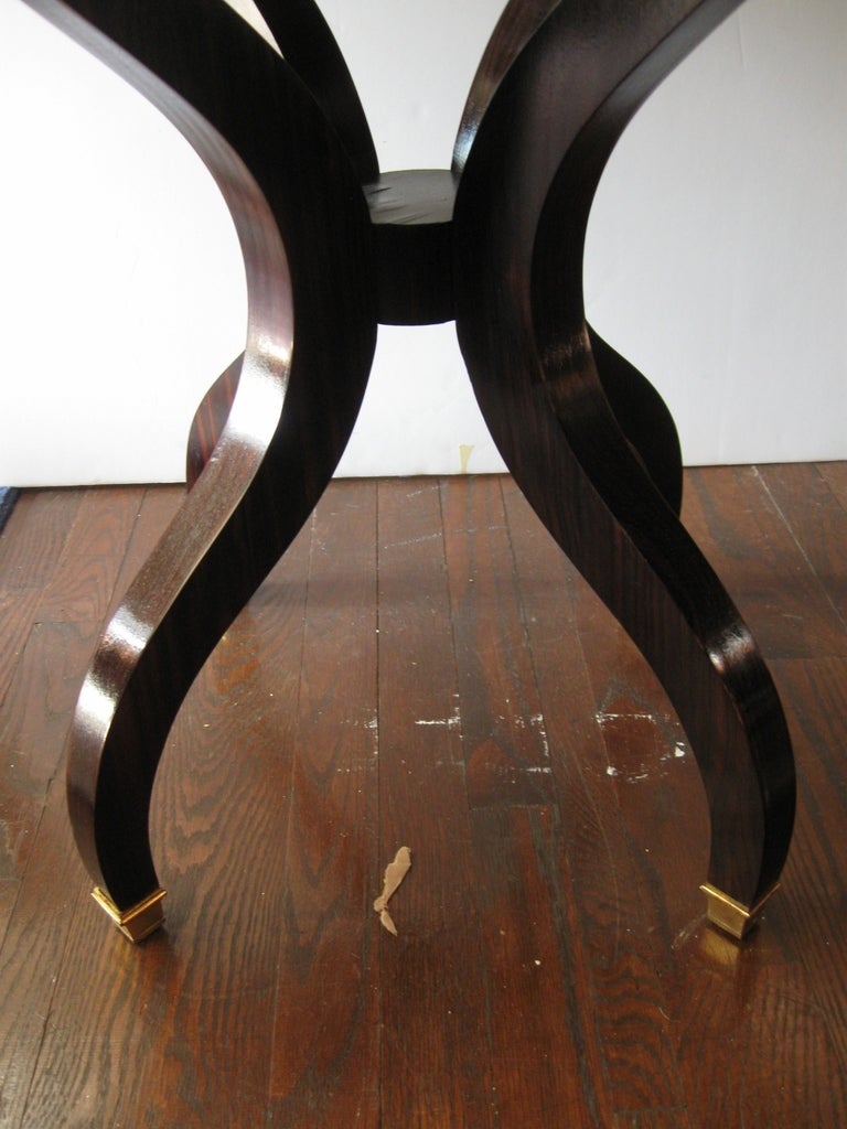 Pair of elegant Macassar ebony round occasional tables with bronze feet