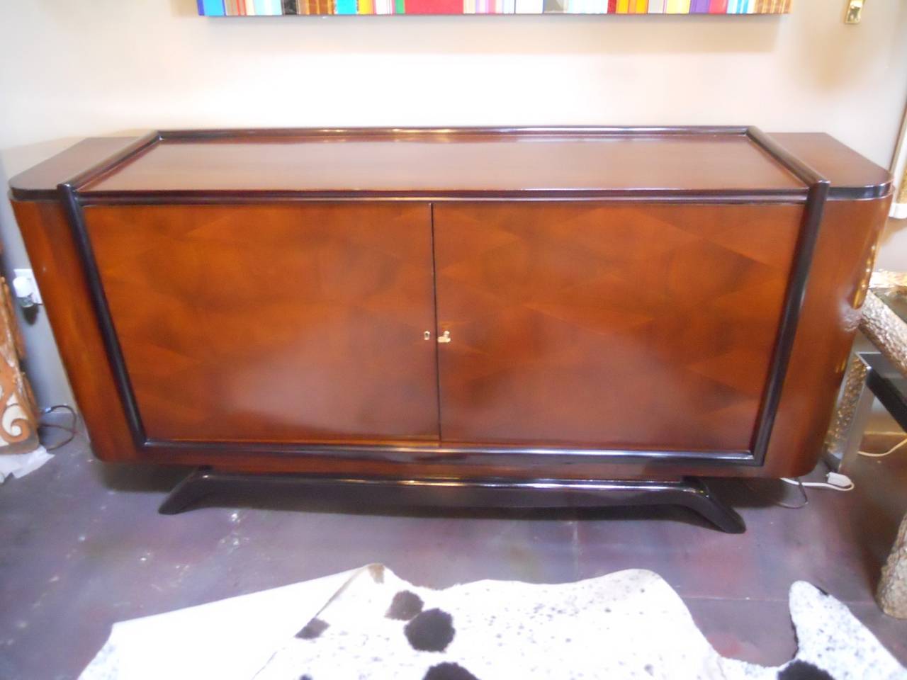 Luxe deco credenza.
One shelf.
Walnut and mahogany wood parquetry.