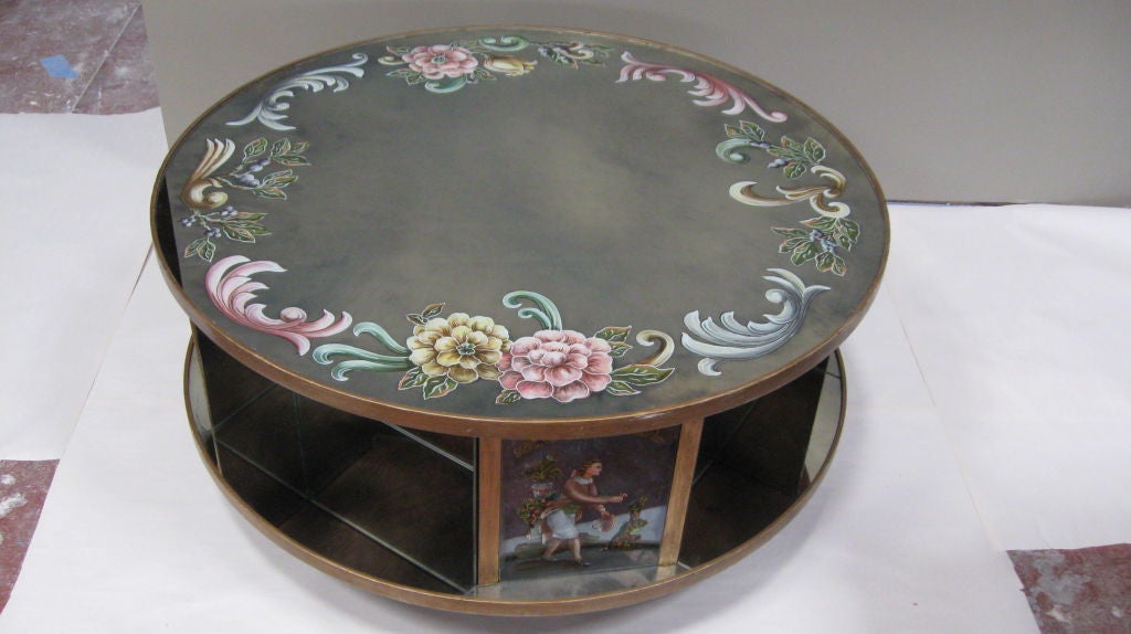 ROUND ROTATING HAND PAINTED MIRRORED COFFEE TABLE.