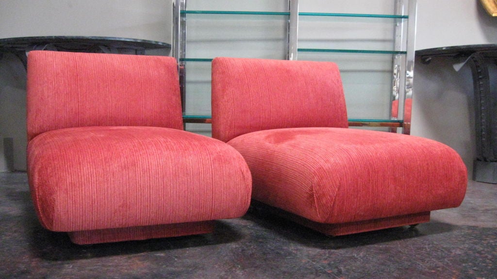PAIR OF SLIPPER CHAIRS BY J ROBERT SCOTT. NEWLY REUPHOLSTERED. HIDDEN BASE WITH BRASS CUP CASTERS.