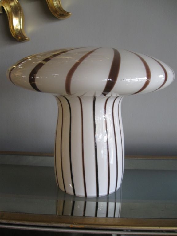 A whimsical Murano glass lamp by Vistosi in the shape of a striped mushroom. Diameter of the base is 6