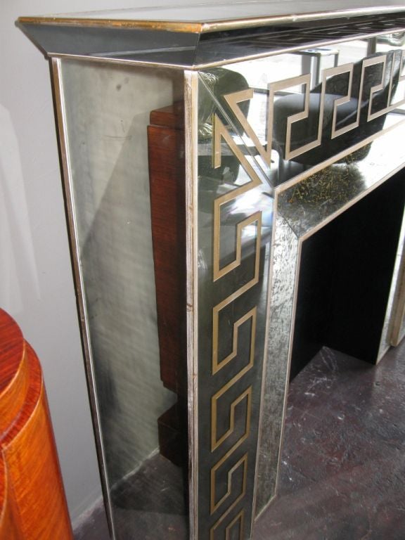 Mid-20th Century Hollywood Regency Mirrored Greek Key Fireplace Mantle