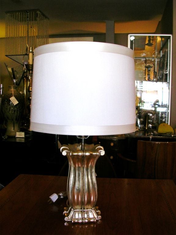 A pair of white gold Capri lamps by Bryan Cox.