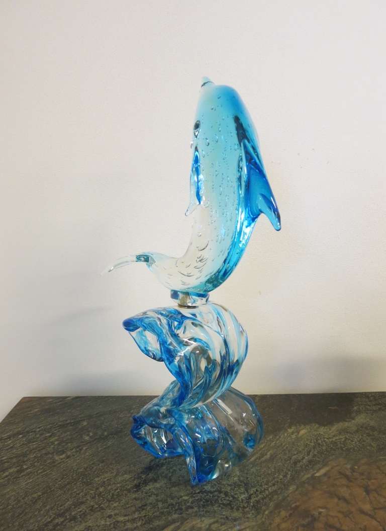 glass dolphin statue