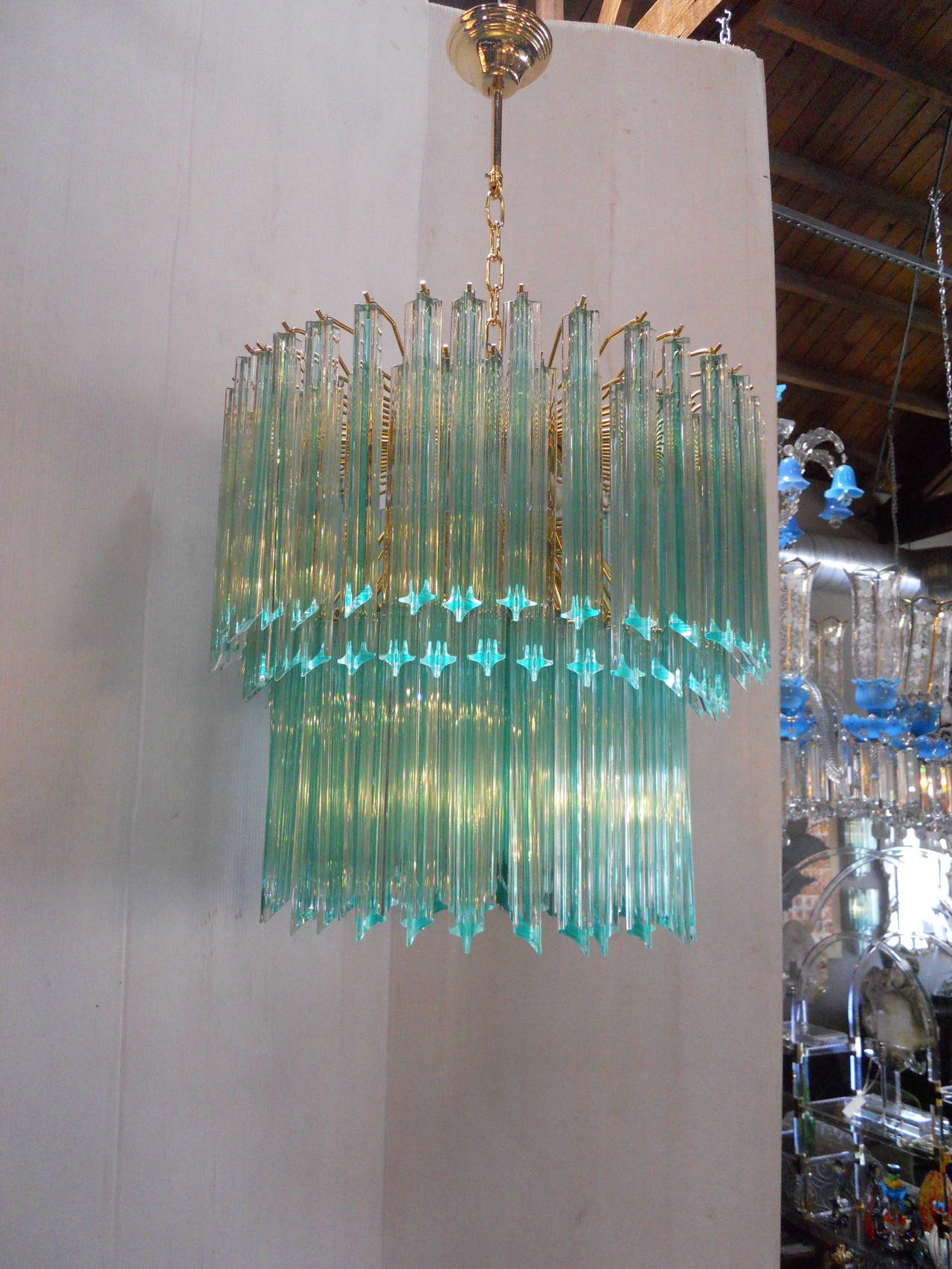 Lovely pair of Venini aquamarine chandeliers.
Purchased from The President Hotel, Brescia, Italy. The hotel was opened in 1960 and closed in fall of 2013.
The measurements of the chandelier mentioned below is just for the body of the chandelier.