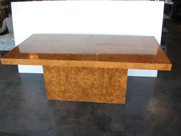 Rare Milo Baughman Dining Room Table made of birds eye maple wood. This piece comes with 2 extensions (18