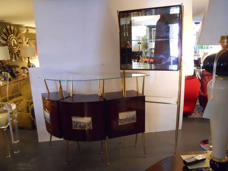 Astonishing Standing Bar and Mirrored Cabinet in the Style of Gio Ponti. Standing Bar curves and has a curved clear glass top, which is 16