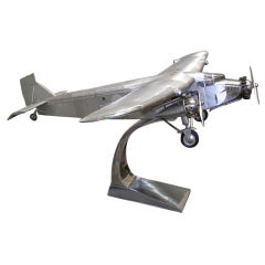 Aluminum Model of a Ford Trimotor Airplane on Stand