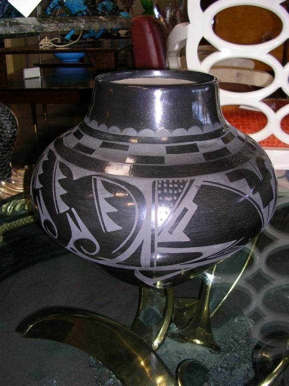 A large and impressive San Idelfonso Pueblo blackware pottery jar by master potter, Carmelita Dunlap (1925-1999). The jar is signed on the bottom -- 1982 Carmelita Dunlap San Idelfonso Pueblo.