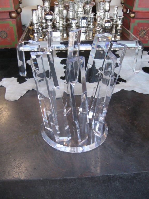 A wonderful Lucite iceberg table from the 70's reminiscent of the style of Charles Hollis Jones. Supports consist of these thick sculpted diagonal posts that are 1 1/2