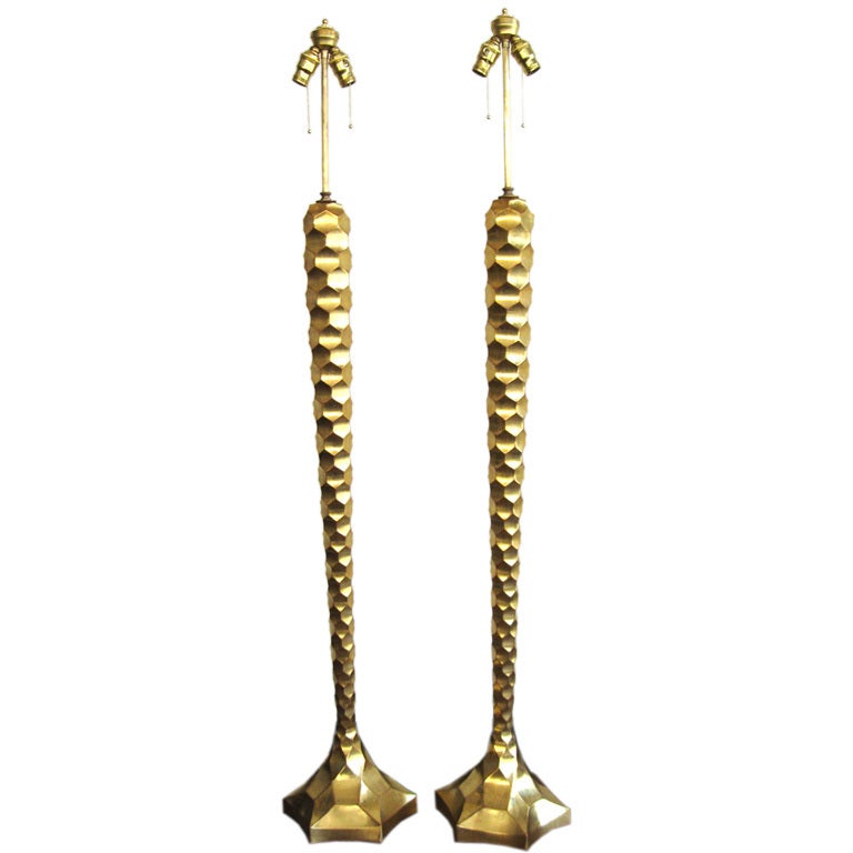 A wonderful pair of Florence floor lamps by Bryan Cox. These are in a composition honeycomb design in 22k real gold.