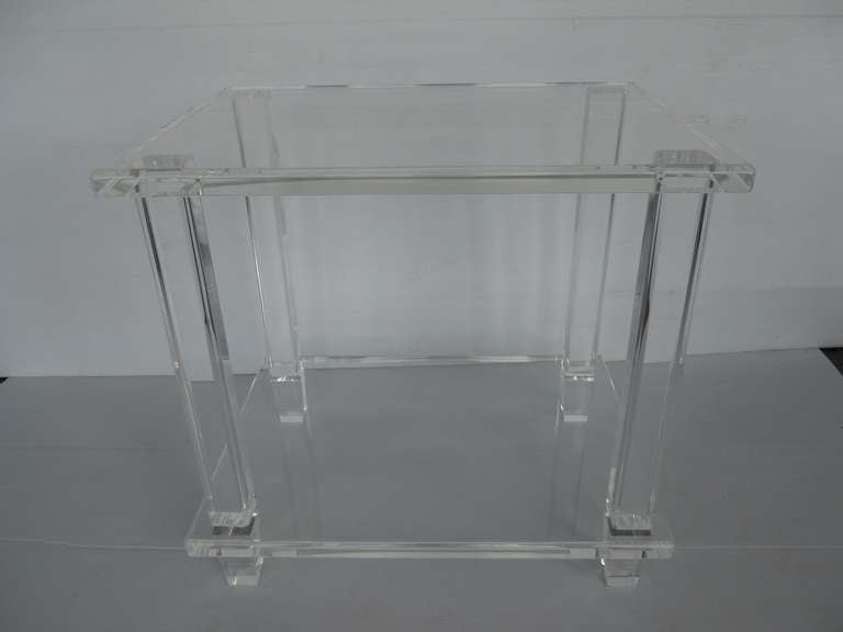 Classy Pair of Lucite Tables
newly polished 
made of thick lucite (legs 1.75