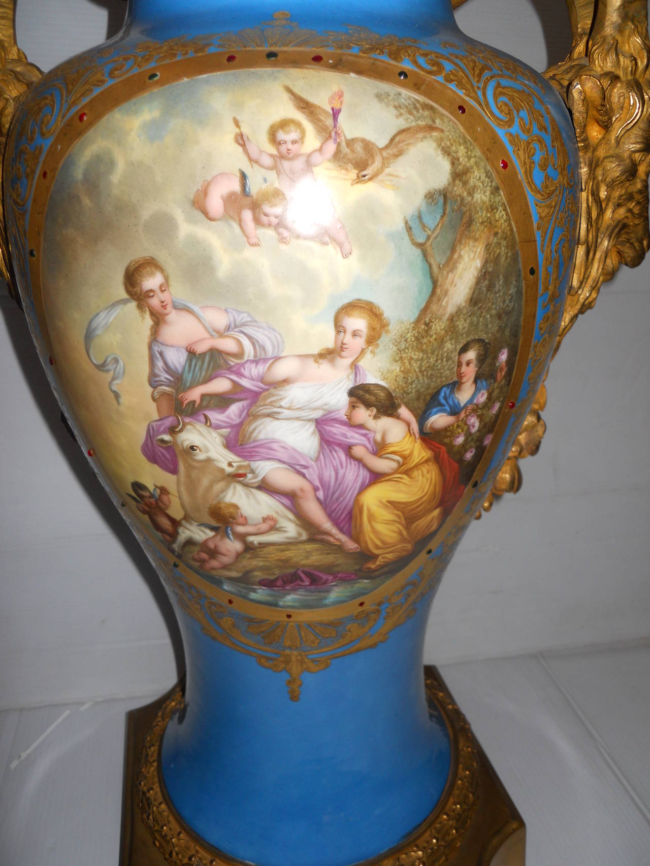 Louis XV Ornate Pair of Cobalt Porcelain and Gilt Bronze Sevres Urns