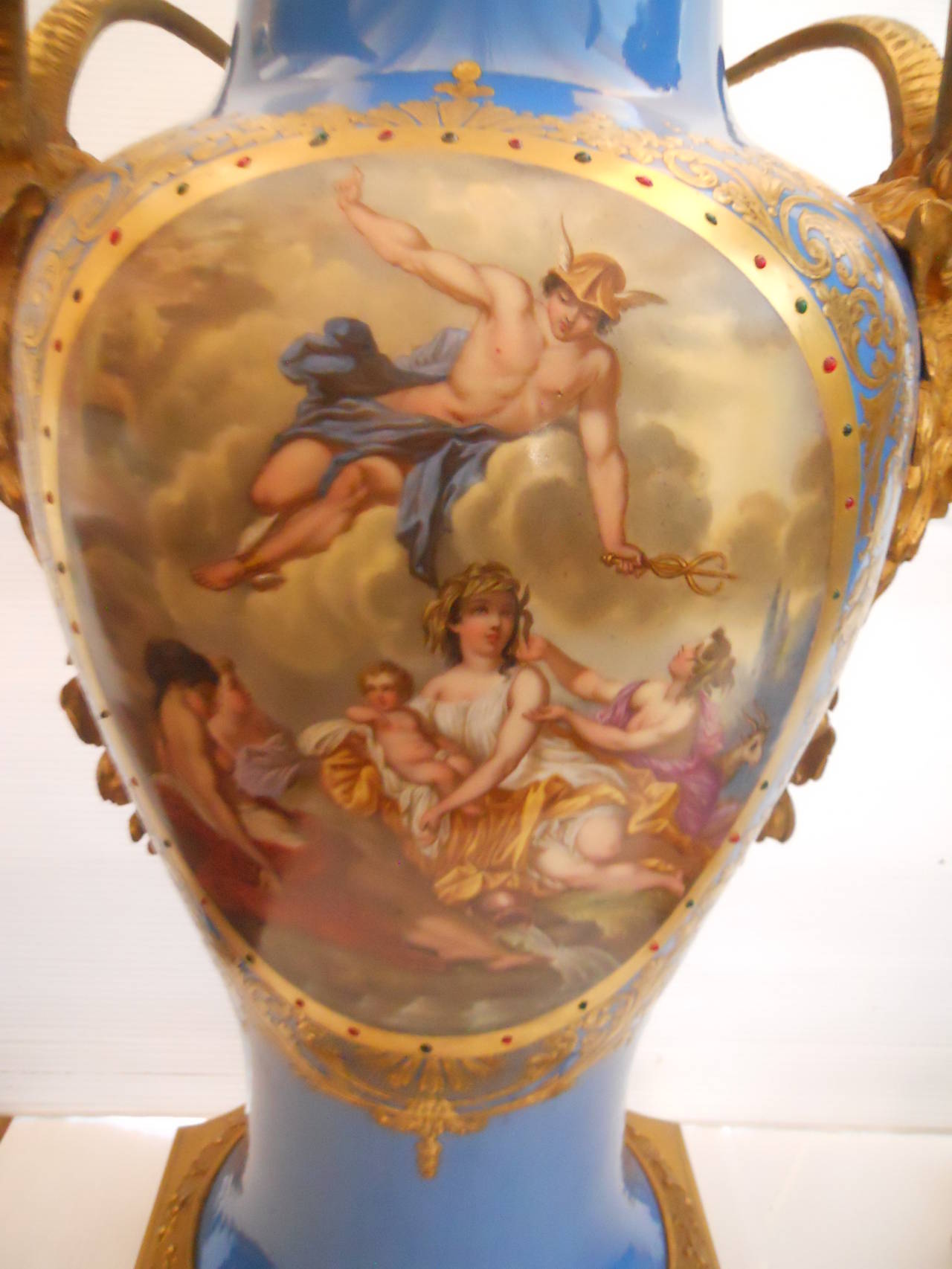 Ornate Pair of Cobalt Porcelain and Gilt Bronze Sevres Urns In Excellent Condition In Los Angeles, CA