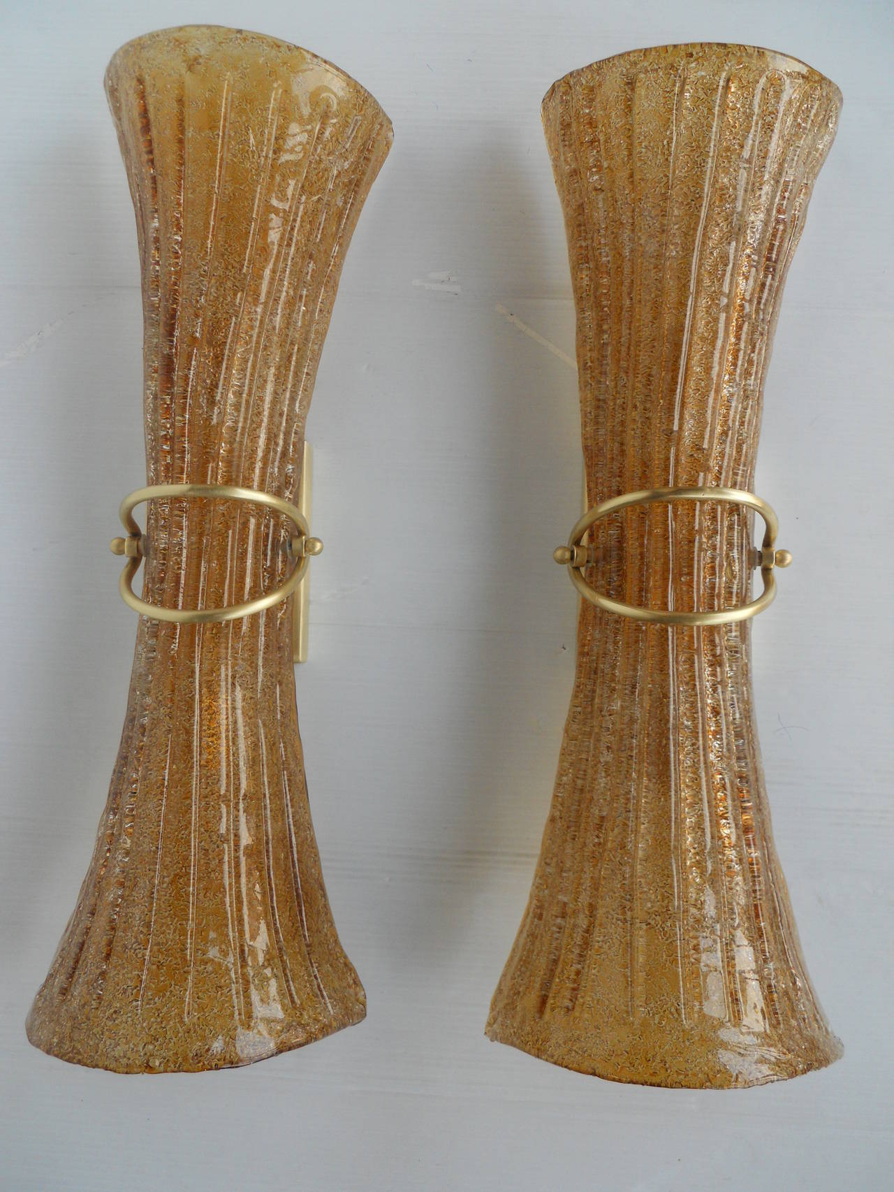 Great Pair of Italian wall sconces.
Because these are handmade each one is unique and slightly varies in size. The size of one of them is listed below. And the other one is 22.5