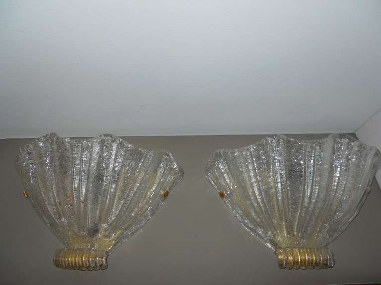 Magnificent Set of 6 Murano Wall Sconces with gold flecks
only 1 is cracked but it is not noticable