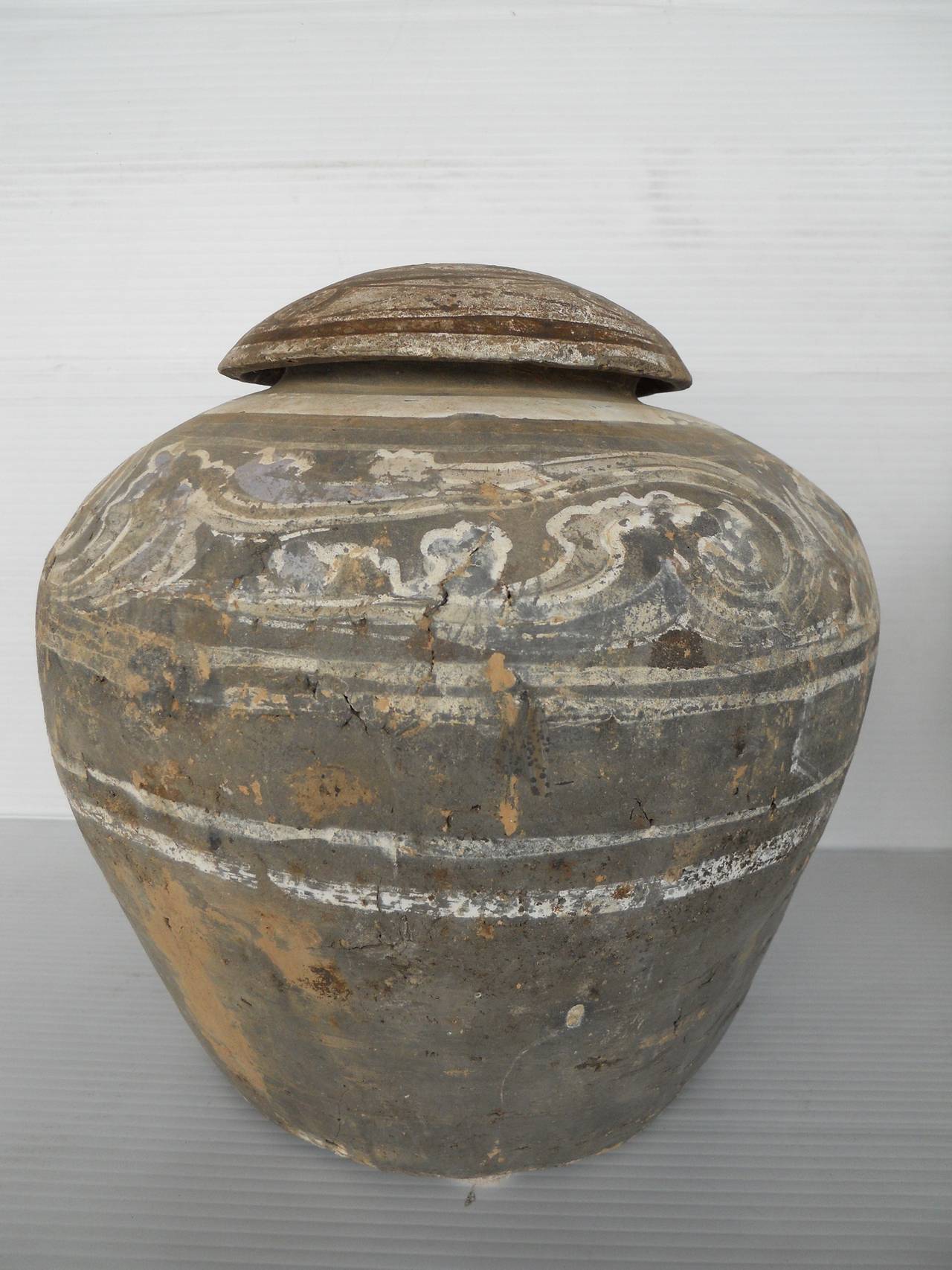Han dynasty set of urn and vase,
circa 206 B.C. - 220 A.D.
The dimensions below are for the urn on the left.
The dimensions for the vase on the right: 14