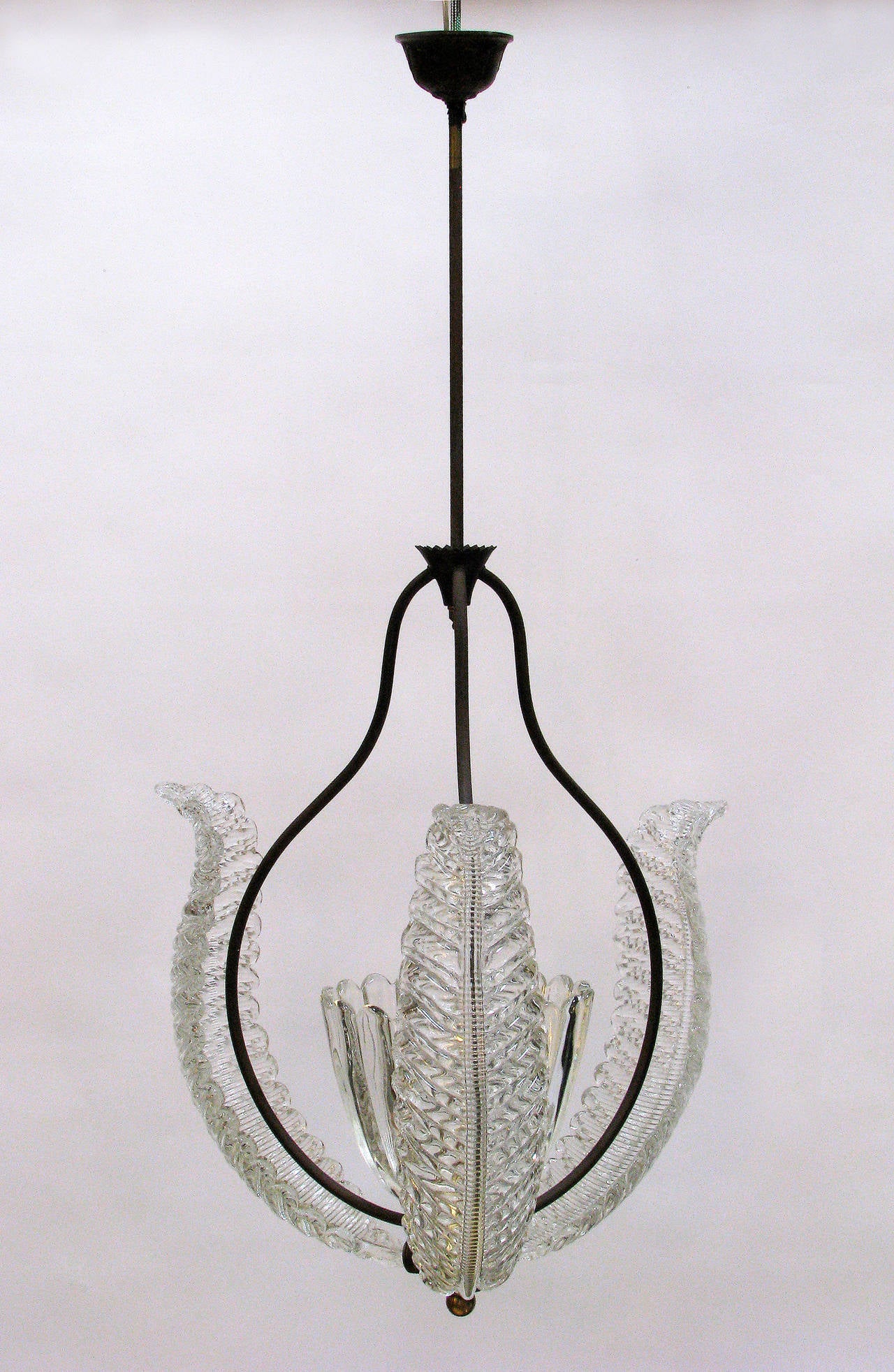 Barovier glass bell and leaves chandelier
handblown glass.
The metal rod connecting to the canopy can be shortened or extended upon request.