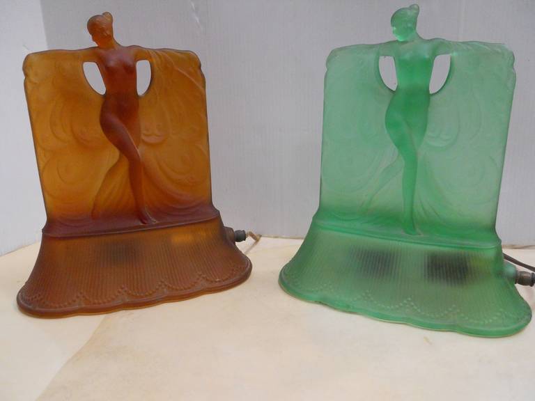 Set of two Danse de Lumiere table lamps (Dance of the Light) by McKee Glass Company.
each piece has the original markings (please see the pics).
We will rewire both pieces.