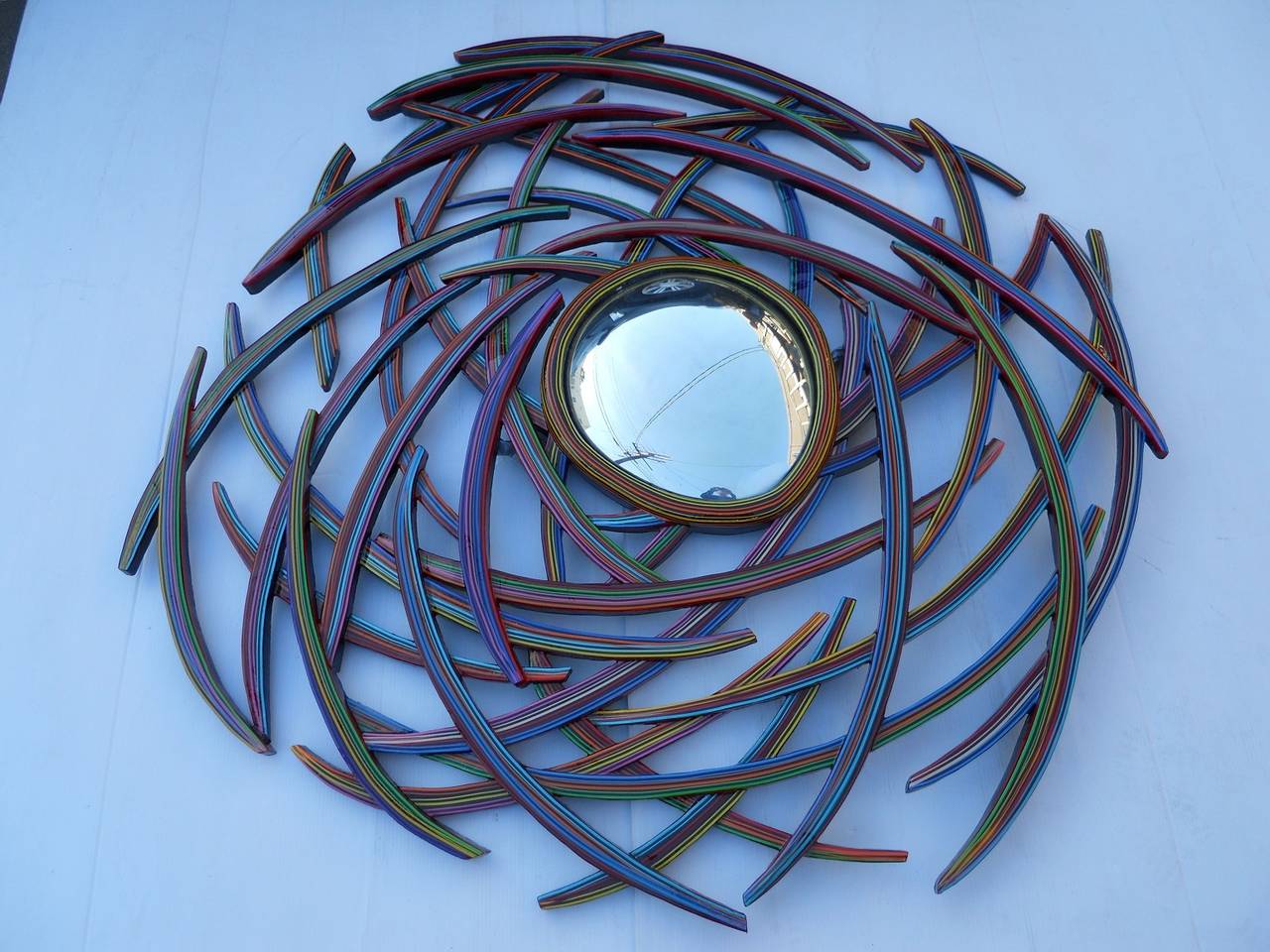 Astonishing mirror.
Mauro Oliveira took original 1970s mirror modified in 2014.
Signed and dated by artist Mauro is a Brazilian artist who immigrated to the US and currently lives in Los Angeles.