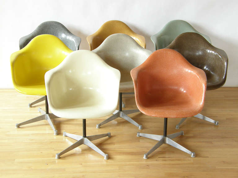 Nice grouping of 8 swiveling, fiberglass chairs by Charles Eames for Herman Miller. Earthy mix with some unusual and rare colors.
All vintage shells and bases but not original to one another.