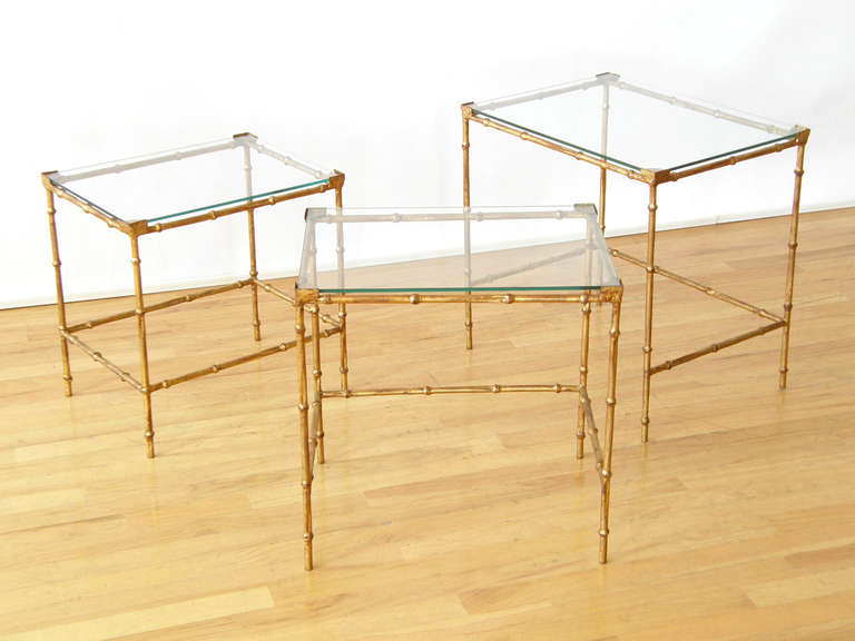Set of Three Gilt Iron Faux Bamboo Nesting Tables with Glass Tops 1