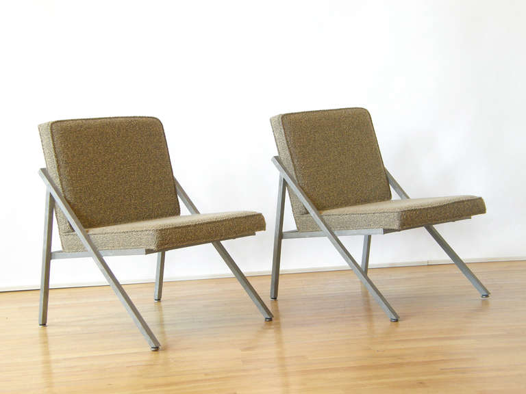 Pair of lounge chairs with trim upholstery and angular, magnesium frames by Dwight of Grand Rapids. 

This pair of chairs came from the home of Paul MacAlister, noted Chicago area architect, designer and miniaturist. Among his numerous