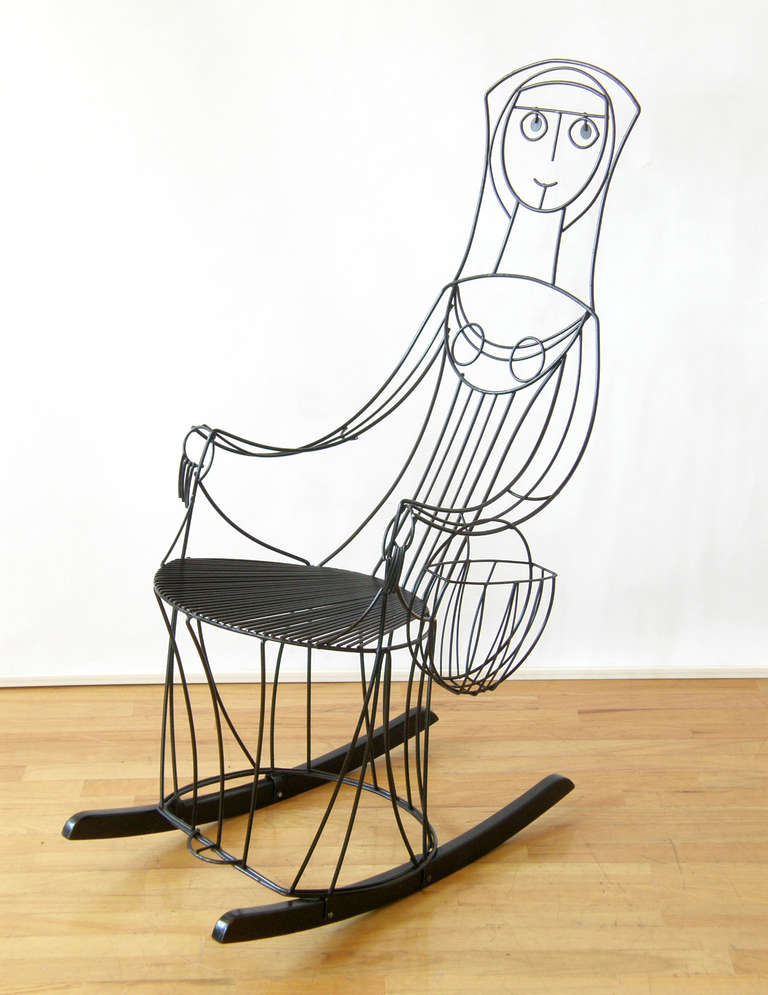 Sculptural, iron rocker in the form of a lady by John Risley. The handbag (or basket) magazine holder is a nice, whimsical detail. 

Please use Contact Dealer button if you have any questions.