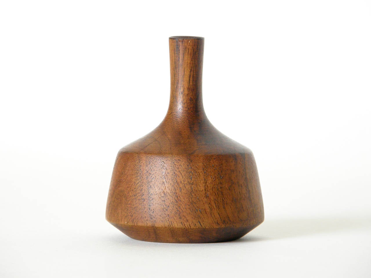 Turned walnut miniature vase or 