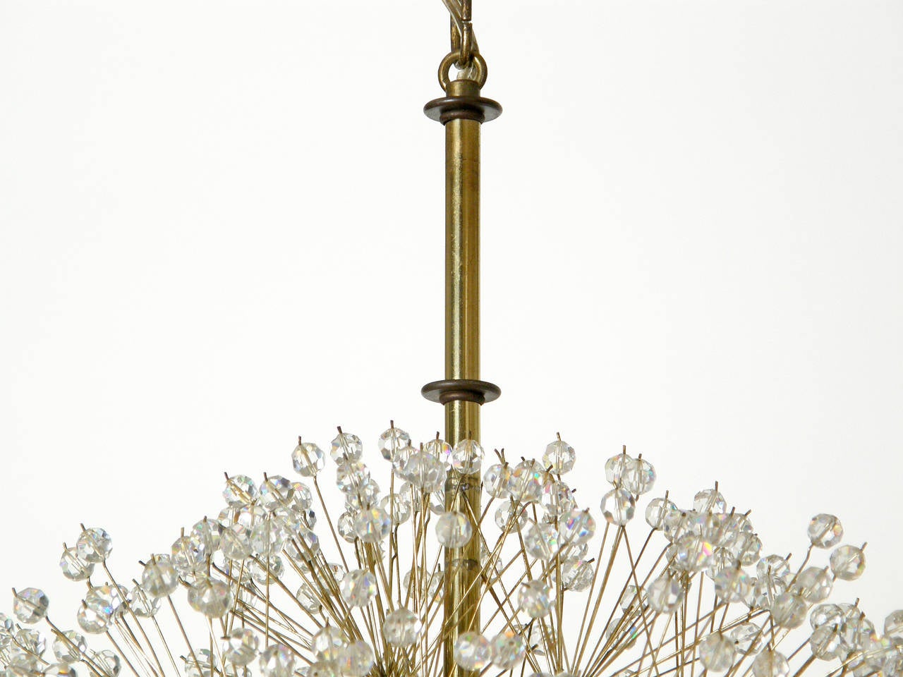 Ceiling fixture in the form of a dandelion clock, in the style of Emil Stejnar. Studded with facetted crystals, this chandelier is a sparkling orb when lit.

sphere- 18