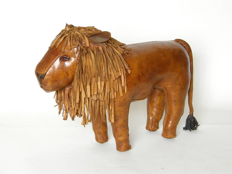 Charming leather lion footstool designed and produced by Dimitri Omersa, U.K. Sold in the U.S. by Abercrombie & Fitch.

Please contact us if you have any questions.