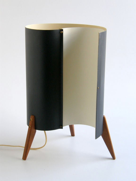 Black and white sheet aluminum lamp on teak legs. Very nicely made, sculptural form uplight with diffused illumination over white panel. Probably Scandinavian.
Please use Contact Dealer button if you have any questions.