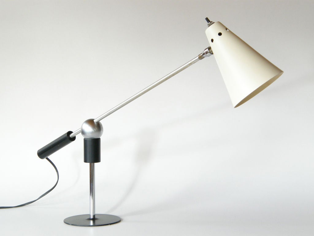 Magnetic ball desk lamp by Yasha Heifetz and Gilbert Watrous, based on the award winning floor lamp designed by Watrous for the 1950-1951 M.O.M.A. lamp design competition.

Please contact us if you have any questions.