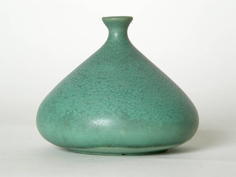 Teco vase with lovely matte green glaze, designed by W.D. Gates.

Please contact us if you have any questions.