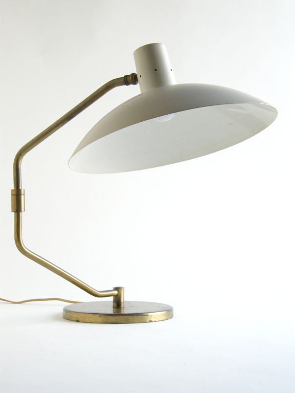 One of the first offerings in lighting by Knoll was Clay Michie's desk lamp. It has excellent functionality. The swiveling arm gives it a long reach, and the ball and socket joint provides a range of adjustable positioning of the shade.

Produced