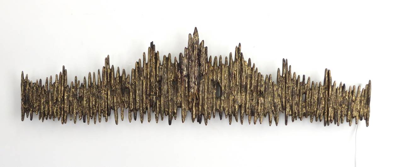 Brutalist bronze wall sculpture by Luciano Frigerio, 
Italy, circa 1970. Incredibly textured and organic bronze sculpture.
Luciano Frigerio, May 21, 1928 - April 11, 1999): Cabinetmaker and designer, created a series of furniture designed as unique