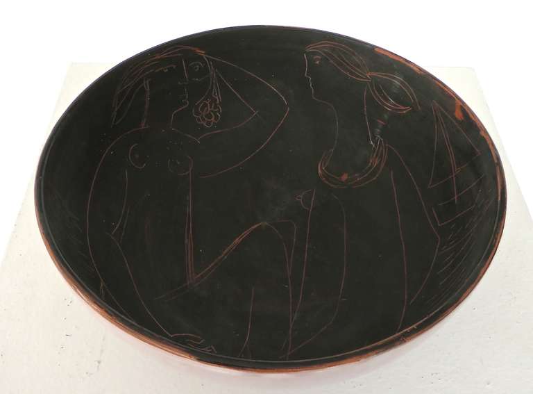 This large ceramic bowl created by Nydia Innocenti in Vallauris, France shows the influence of Picasso who was working in Vallauris at the same time with Suzanne Rami at Madouras. Nydia worked with her husband Jacques Innocenti in their studio in