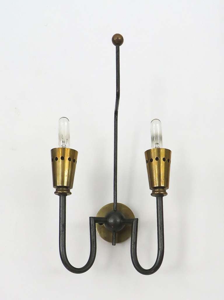 C1940 French sconce with canon finish and brass details with two light sources. 
40 W bulb. Anonymous design.