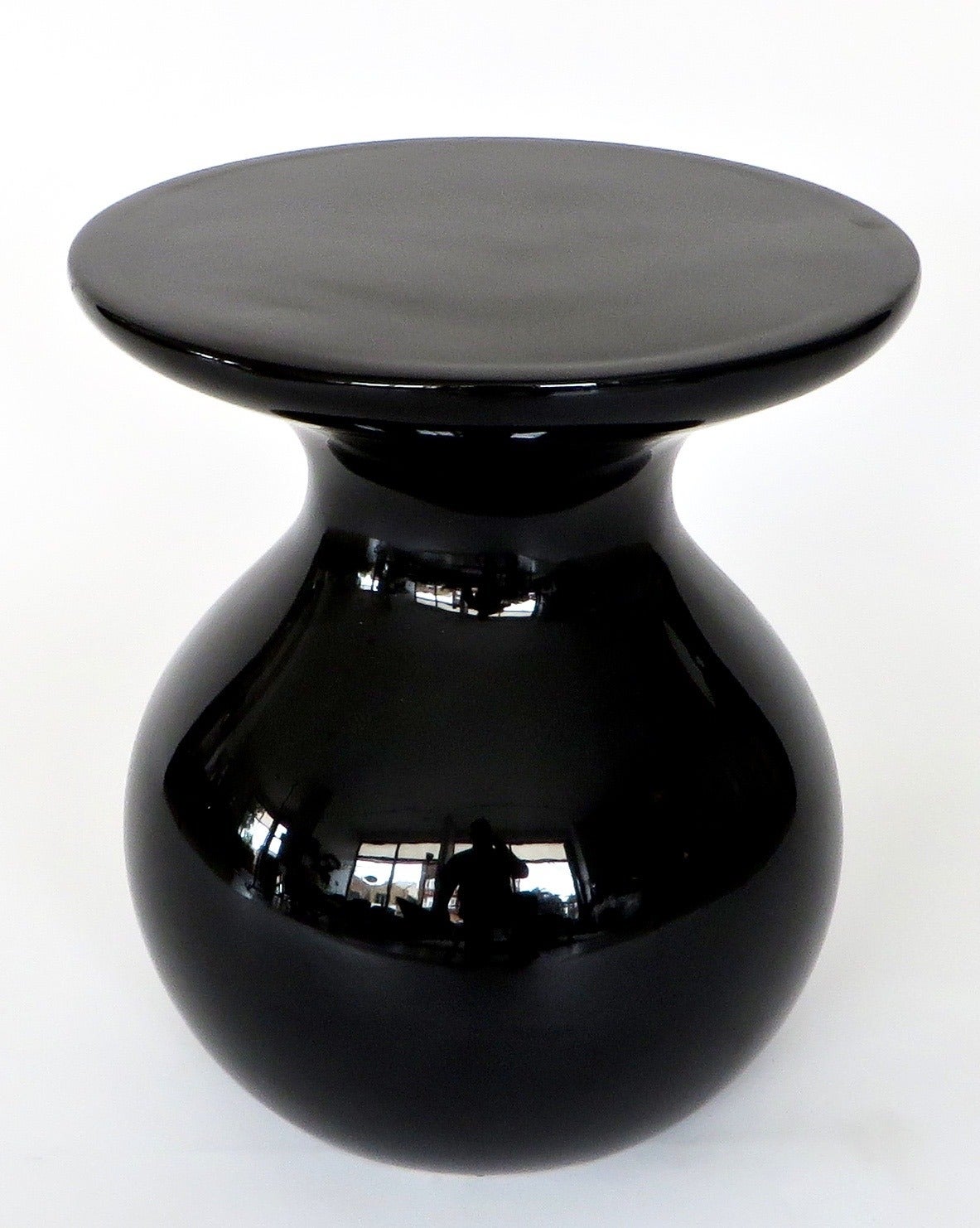 A black ceramic side table 